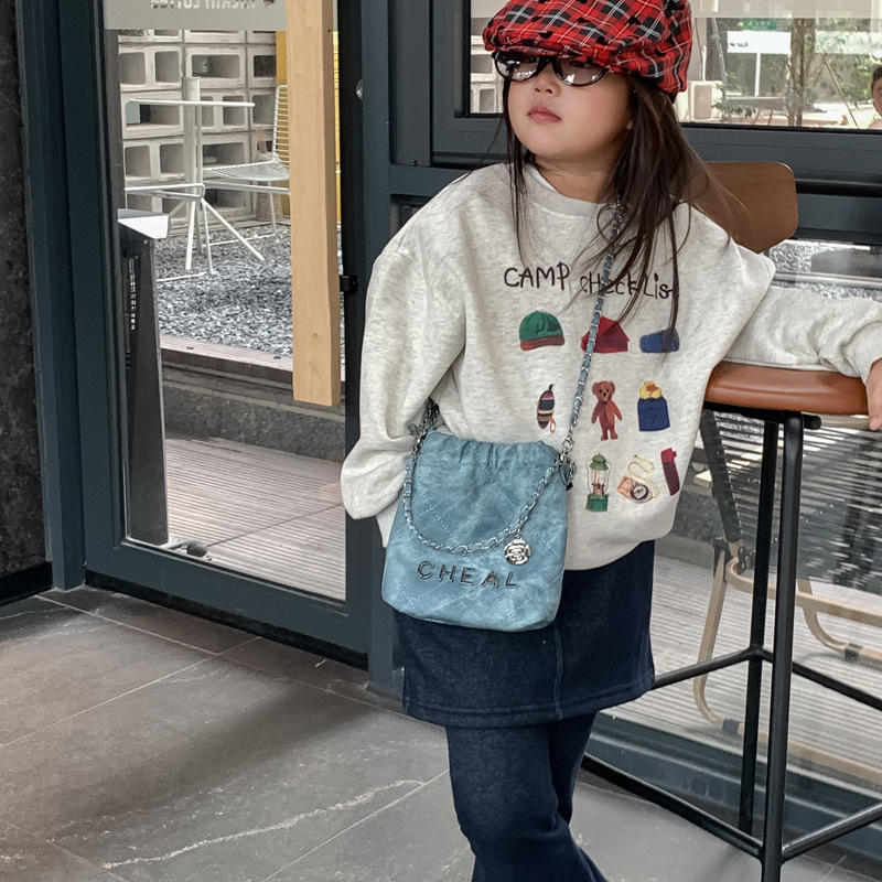 Bolsas de hombro de moda coreana para niños y niñas letras de aire extranjero bolsas de basura de color sólido rango 2025 nuevas bolsas de cadenas para niños