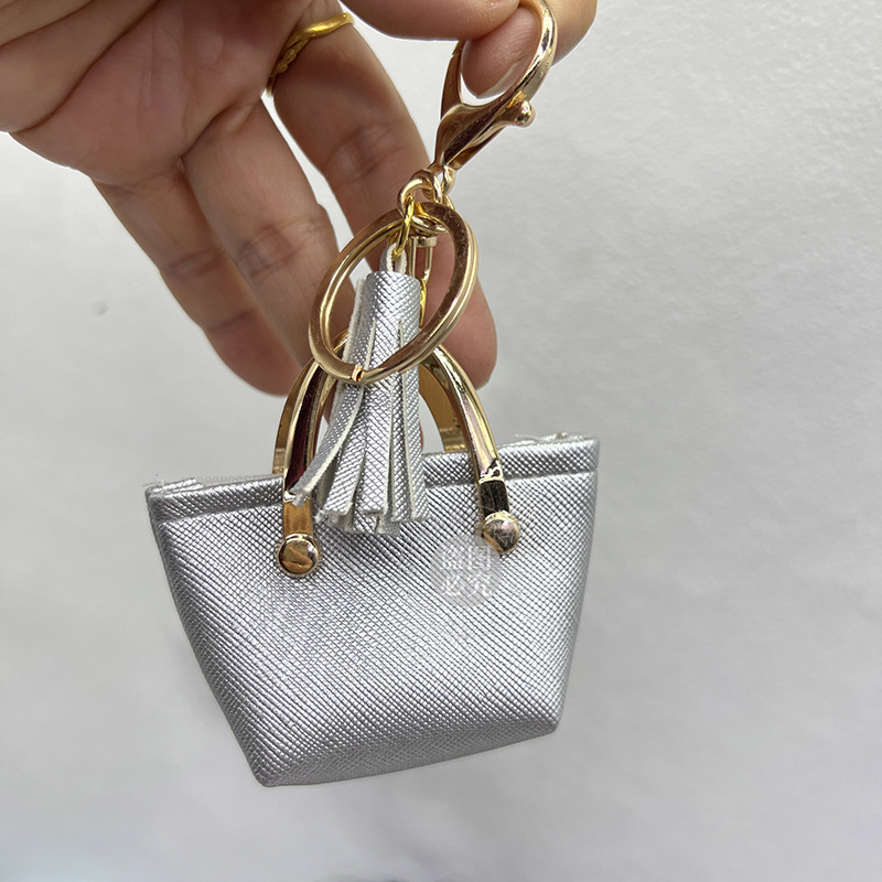 Llavero para mujer, bolso, colgante, joyería, mini monedero de almacenamiento de cuero lindo europeo y americano