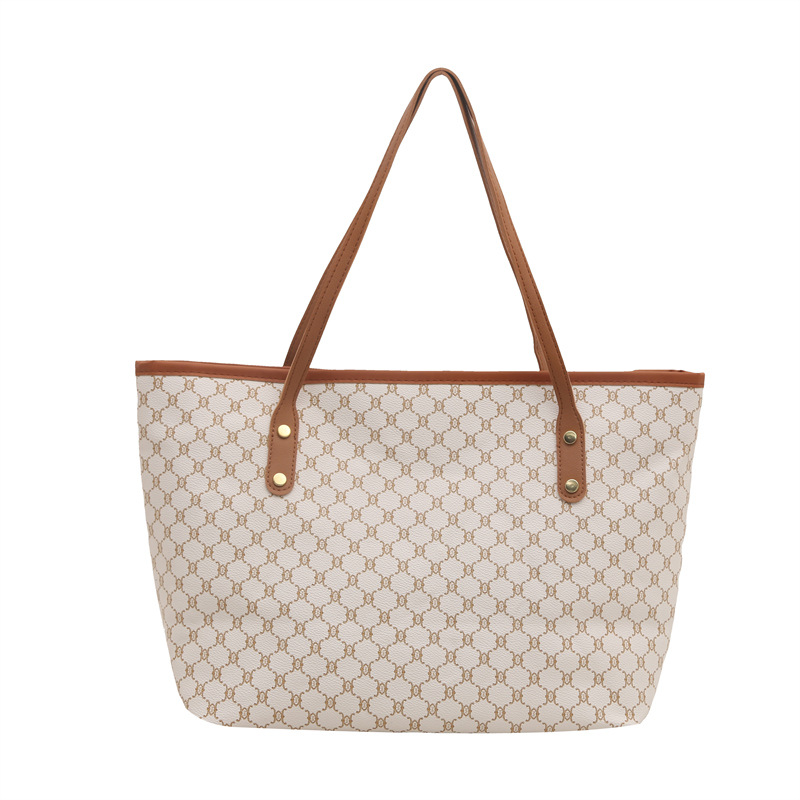Bolsos sencillos y de moda de gran capacidad para mujer 2025 primavera nuevo bolso de moda bolso de hombro portátil de gran capacidad para viajeros