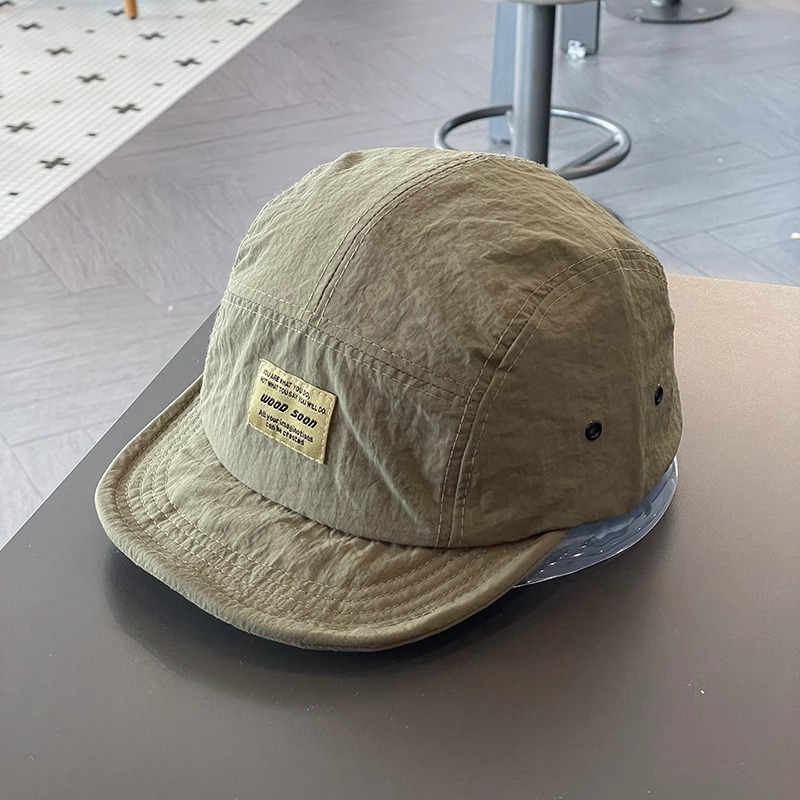 Estilo japonés de secado rápido transpirable gorra de béisbol de ala corta para hombres y mujeres ropa de trabajo versátil suave superior hip hop gorra de pico Sombrero de marea de ala suave para mujer