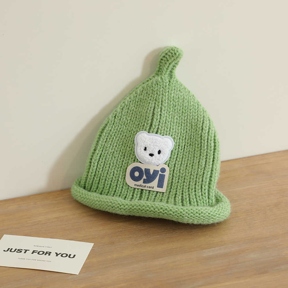 2024 otoño y invierno nuevo unisex lindo sombrero de punto de cabeza de oso simple sombrero de lana casual universal