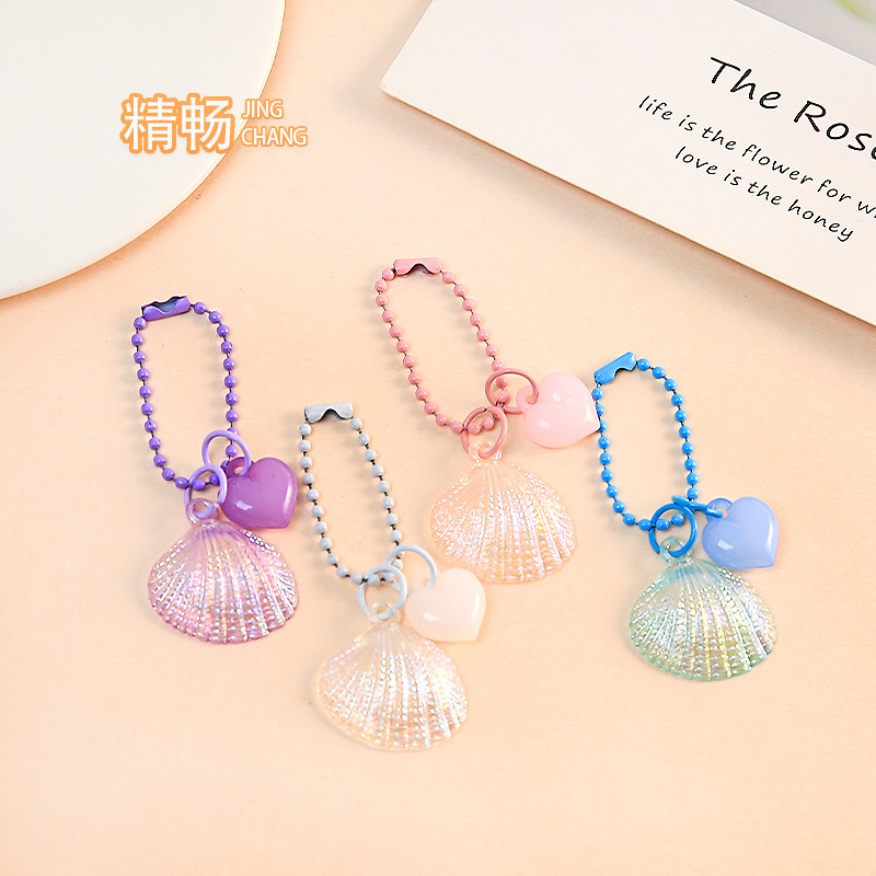 Colorful laser shell pendant keychain accessory, small heart-shaped decoration, versatile and fresh, suitable for bags and phone chains Colorful laser shell pendant keychain accessory, small heart-shaped decoration, versatile and fresh, suitable for bags and phone chains