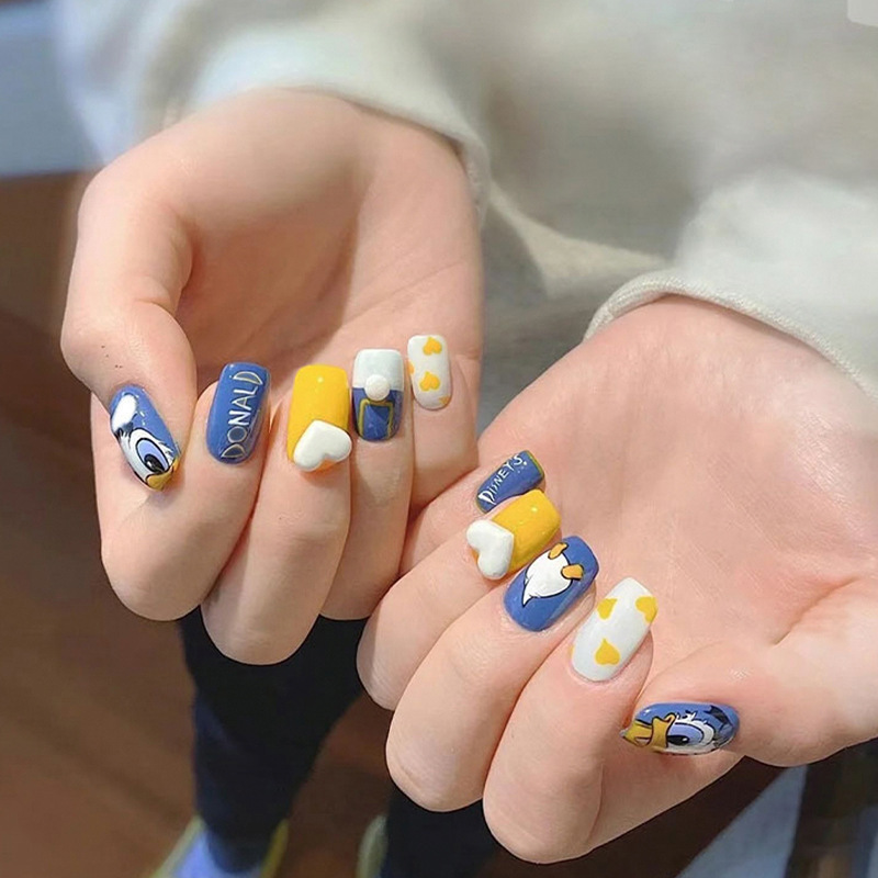 Cute Ventilated Manicure Wearable Nail Pieces Donald Duck 3D Heart-Shaped Detachable Fake Nail Pieces for Students Wholesale Cute Ventilated Manicure Wearable Nail Pieces Donald Duck 3D Heart-Shaped Detachable Fake Nail Pieces for Students Wholesale