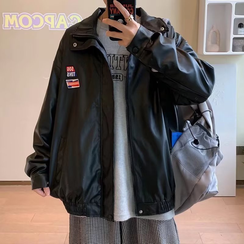 Chaqueta de cuero de pu con solapa de calle principal, chaqueta etiquetada, primavera y otoño para hombres, estilo de Hong Kong, pareja de nicho, chaqueta suelta de calle frita