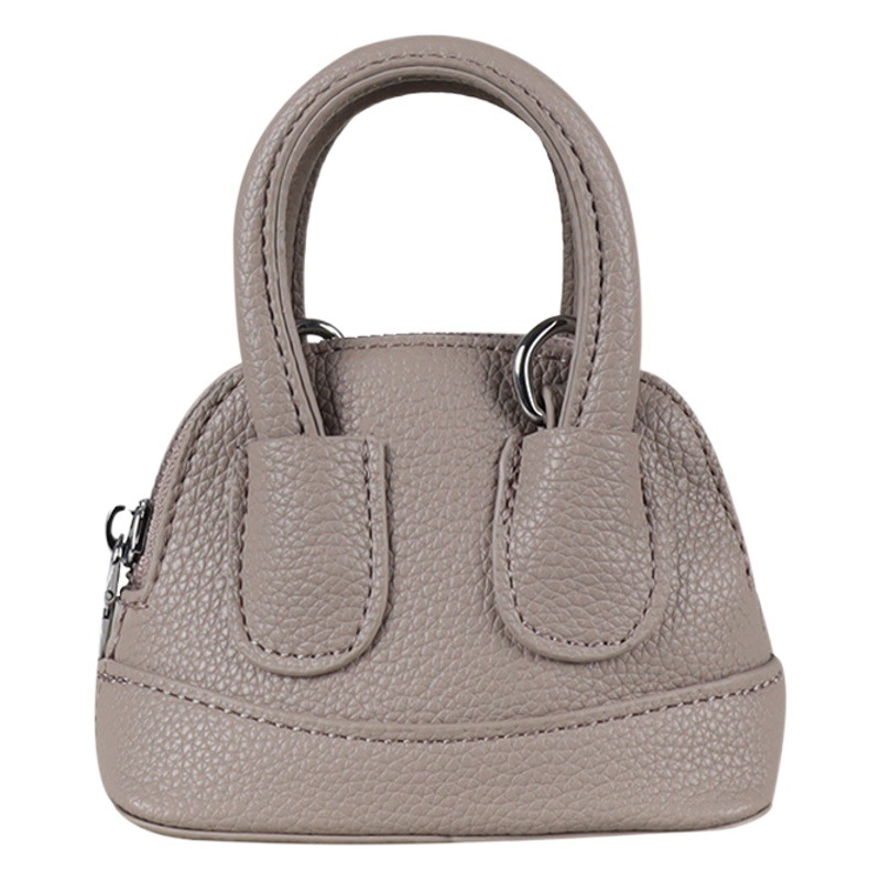 Internet celebridad bolso de los niños bolsa de mensajero de las niñas de moda bebé mini bolso de cáscara simple bolsa de accesorios de salida de las niñas
