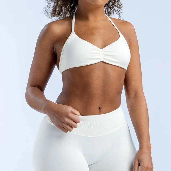 White bra, trousers, lifting effect