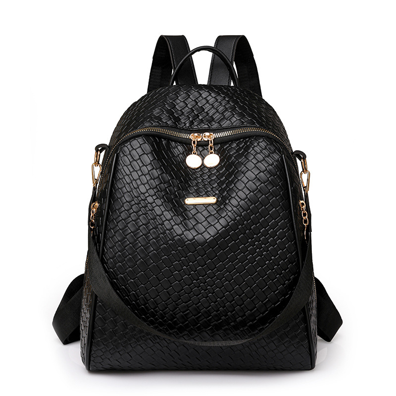 2024 exportación nueva mochila de cuero suave tejida para mujer moda y simple mochila de viaje al aire libre de doble uso marea