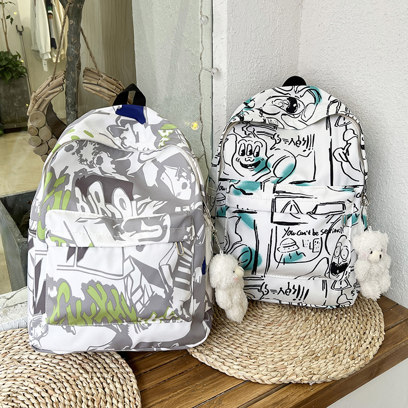 Moda mochila bolsa ins personalizado impreso graffiti estudiante universitario mochila de nylon moda casual todo a juego mochila para mujeres