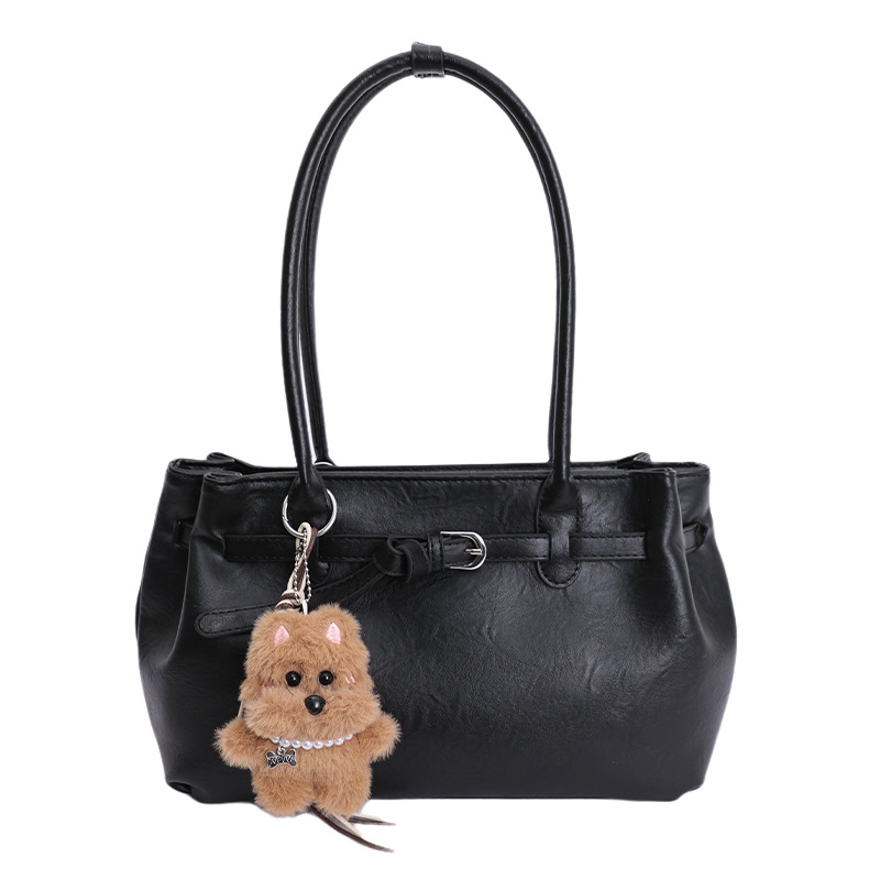 Otoño y invierno bolsas de mano de viaje de mujer bolsas retro de gran capacidad 2025 nuevas bolsas de hombro y brazales casuales versátiles
