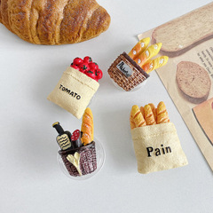 Korean ins paste fun foodie snacks new mobile phone air bag holder telescopic wire winding storage drama artifact