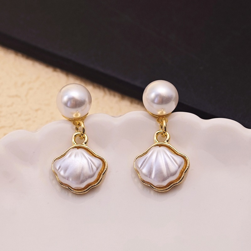 @Oferta especial @ Joyería elegante pendientes simples con lazo de perlas pendientes de moda versátiles de alta gama para mujer pendientes al por mayor
