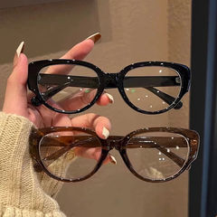 Anti-blue light flat glasses for women, prescription orange cat style, high-end and radiation-proof, black frame glasses with a strong sense of frame.
