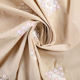 冬季新款亮片绣花羽绒服棉服外套面料 珠片刺绣双层胆布布料