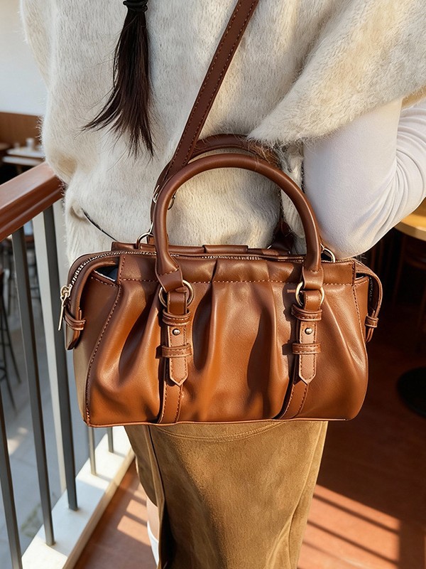 Nicho Zhong bolso de mano plegable Boston 2026 mujer nueva moda transfronteriza alta textura mochila de hombro