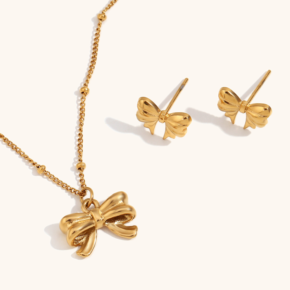 10g Weight 0.03µm-0.05µm Gold Plating Thickness PVD Coated Gold Plating Process 18K Real Gold Plated Plating Material Stone-Free Inlay Material Earrings, Necklace Classification Earrings + Necklace Quantity Daily Occasion 304 Stainless Steel Material Bow Knot Pattern Women's Gender Elegant Style Waterproof Non Tarnish Craft PVD Coated Real Gold Plated 18K Gold Bow Knot 316L Stainless Steel Elegant Waterproof Non Tarnish Surgical Steel Earrings Necklace 无