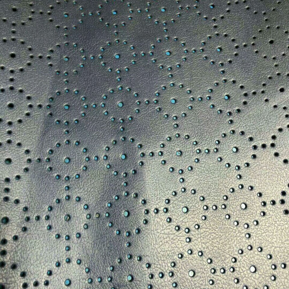 PU皮革面料冲孔PVC牛皮面料激光冲孔加工打孔镂空多花型加工