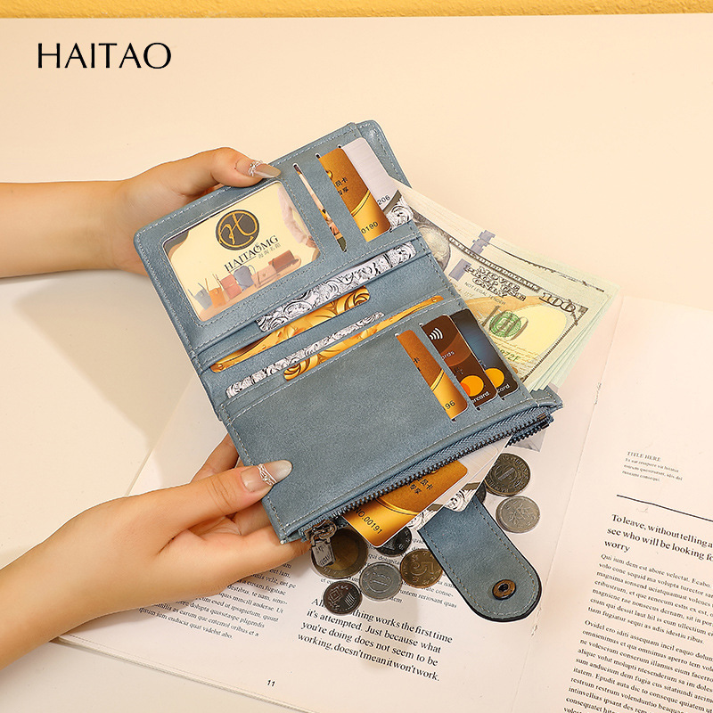 2025 nueva billetera retro de alta gama monedero de cuero dos veces corto con múltiples tarjetas, billetera de mujer