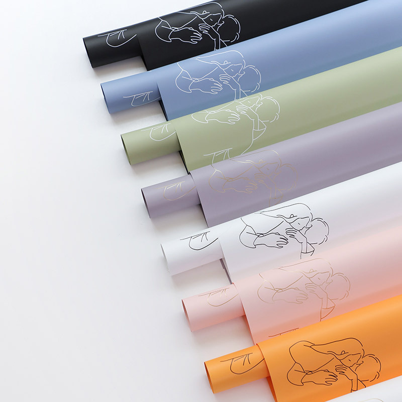 Fábrica de fiestas de flores románticas transfronterizas al por mayor papel de embalaje de flores flores de vacaciones ramo de flores de papel de embalaje impermeable