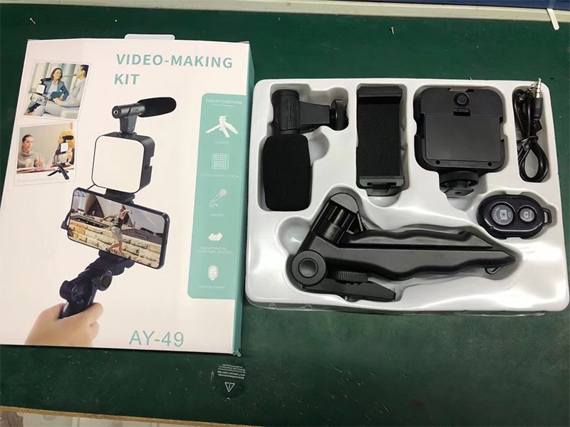 Cross-border AY49 soporte de carcasa para teléfono móvil de un solo botón