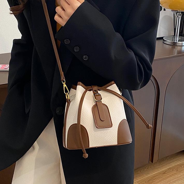 Bolsa de balde de explosión de comercio exterior para mujeres 2025, nuevo estilo universal bolso de hombro simple de alto impacto bolso de nicho de color