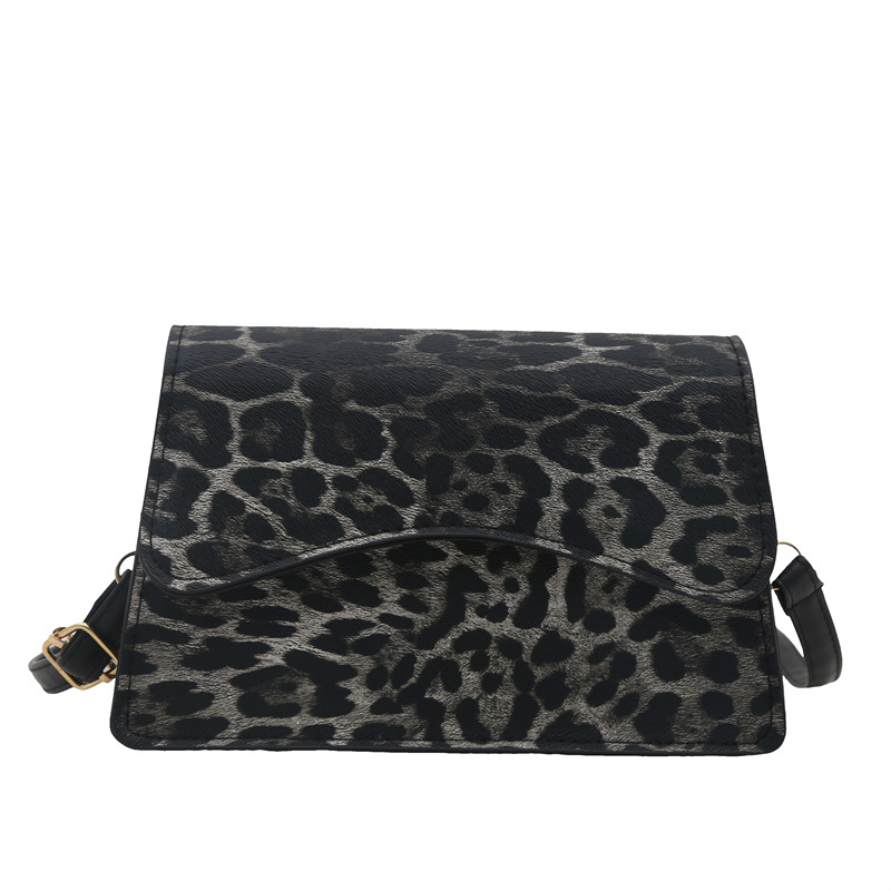 Bagos de brazo estampados de leopardo de estilo extranjero mujeres 2025 primavera de moda europea y americana retro viaje bolso de hombro bolso de forma pequeña
