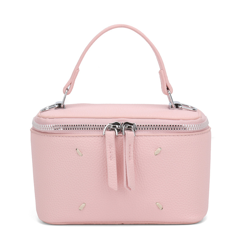 Bolso de caja de estilo occidental de color puro para mujer 2025 nuevo bolso cuadrado pequeño de moda de moda bolso de lonchera de mensajero de un solo hombro de sentido de alta gama