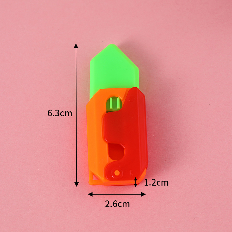 Cuchillo de gravedad 3D explosivo transfronterizo mini portátil de 6cm Cuchillo de zanahoria luminoso Cuchillo de zanahoria de juguete de descompresión