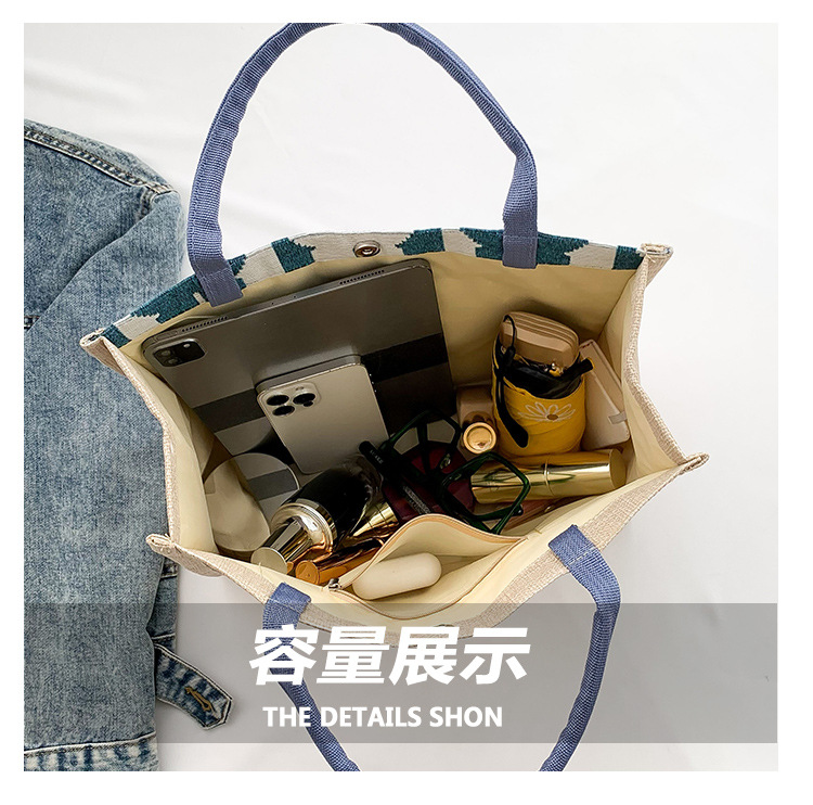 High-end mid-capacity canvas school commuting handbag 2024 new style fashionable and versatile linen single-shoulder tote bag undefined