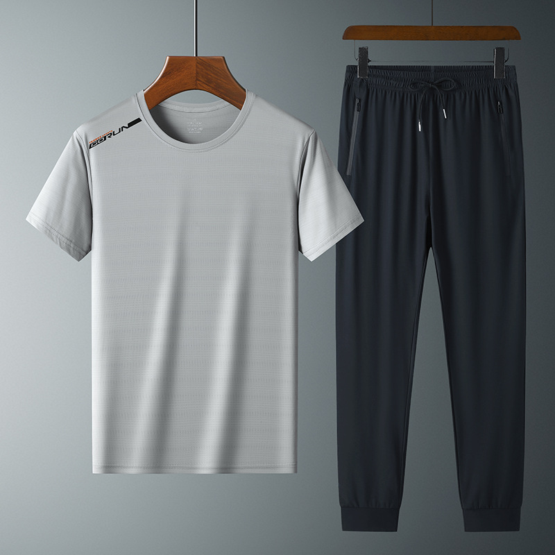 Moda pantalones de seda de hielo cuello redondo Camiseta de dos piezas para hombres talla grande suelta de secado rápido traje deportivo LOGO se puede formular