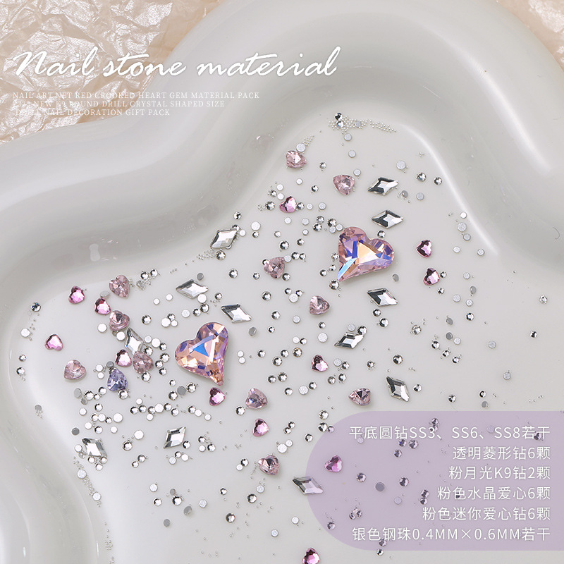 Arte de uñas celebridad en línea corazón torcido gema material paquete nuevo K9 cristal de diamante redondo tamaño especial en forma de diamante decoraciones de uñas al por mayor