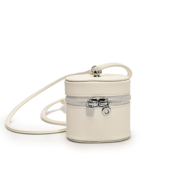 Bolso de hombro para niña coreana simple color sólido mini lindo bolso de cubo para bebé 2025 nuevo bolso de auriculares para niños marea