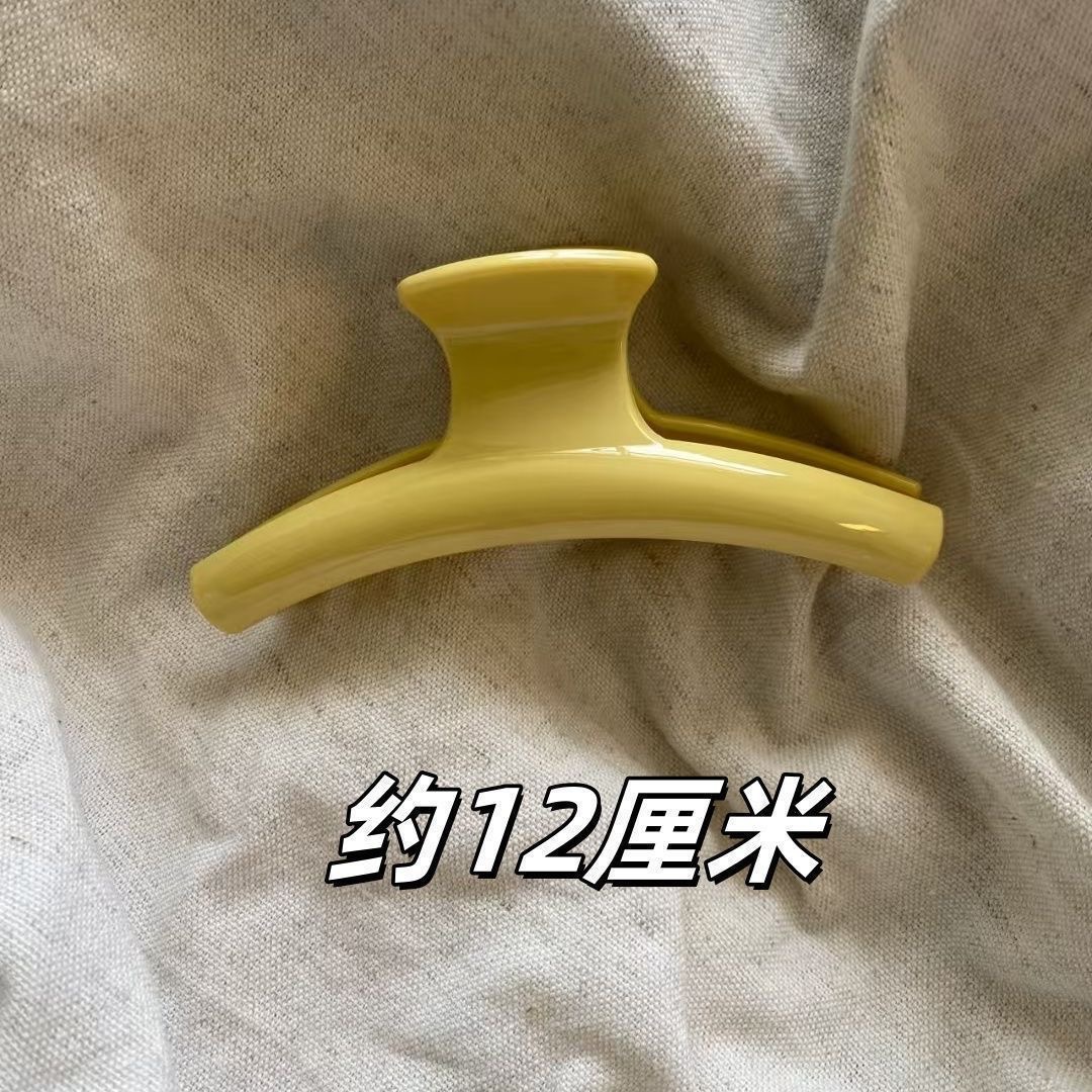 Yellow clothes hanger