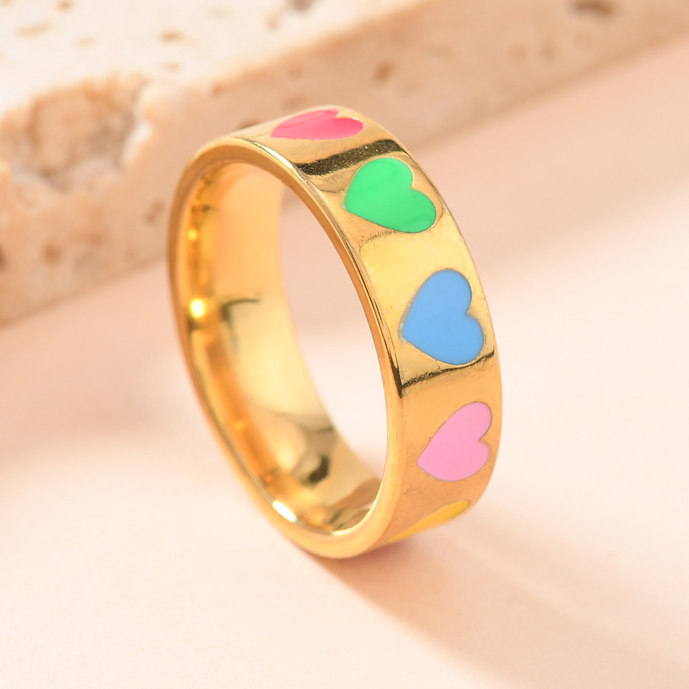 Joyas de acero de titanio creativas bonitas flores de oro gota de aceite de color amor anillo de acero inoxidable fabricantes de mujeres image 3