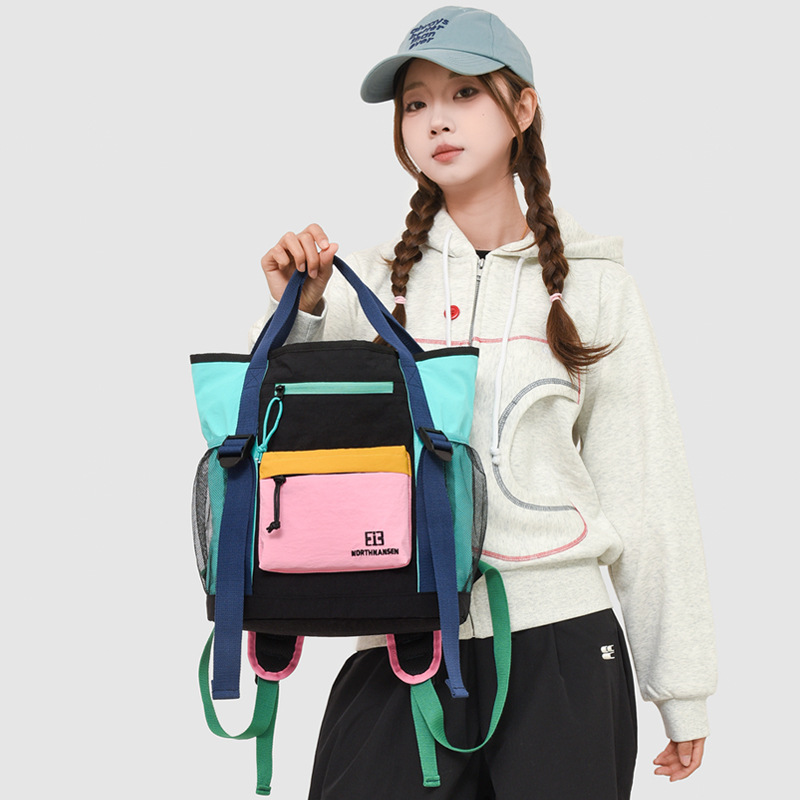 Mochila de moda coreana para niños y niñas, color contrastante, mochila de mano casual de gran capacidad, 2026 nueva moda de mochila infantil