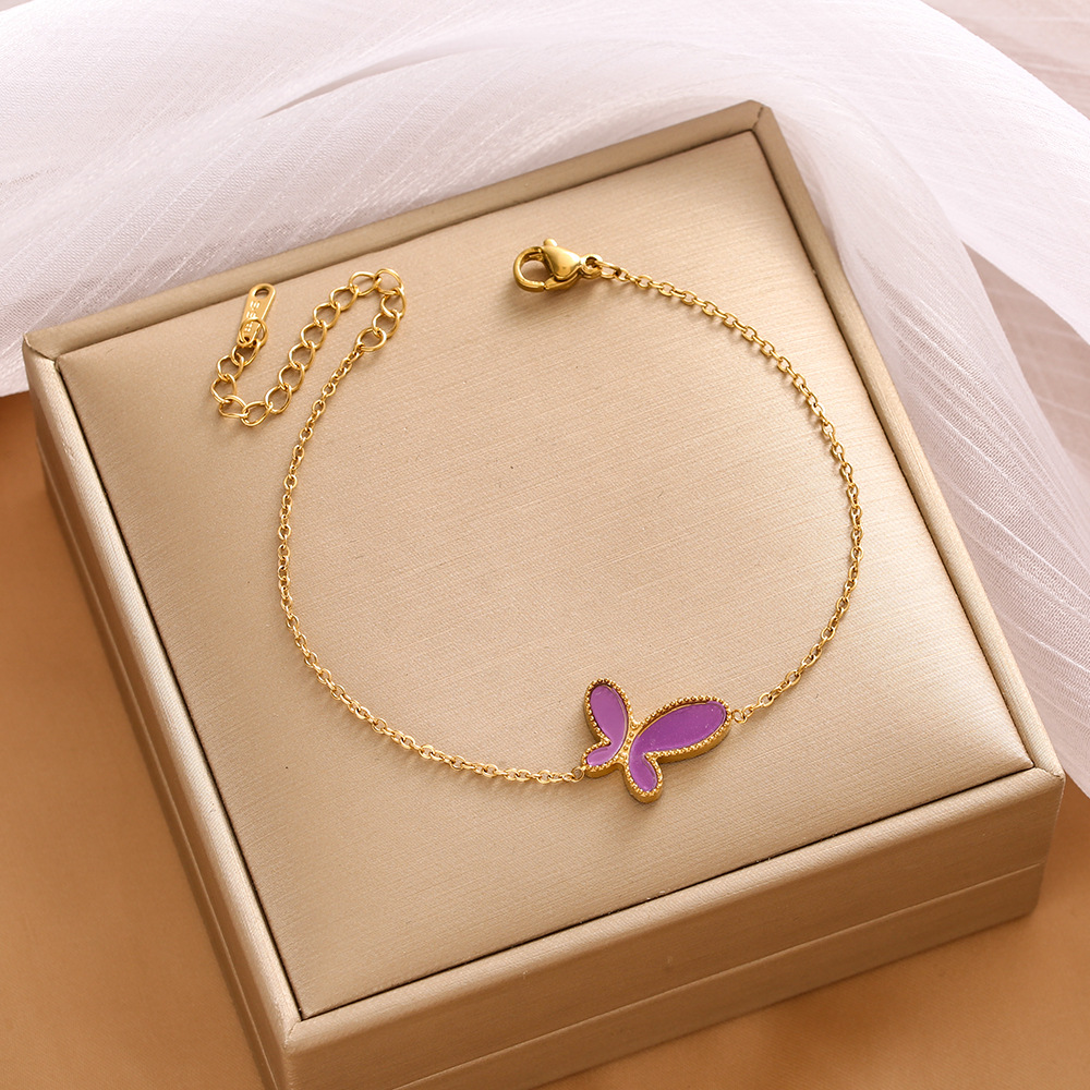 Pulsera de trébol de acero titanium vendedora caliente transfronteriza europea y americana con incrustaciones de concha pulsera colgante pulsera de diseño avanzado sin desvanecimiento al por mayor