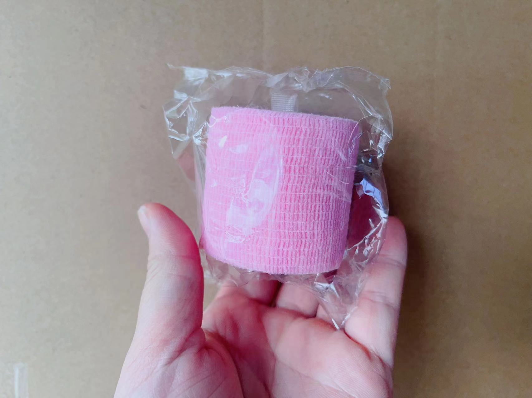 Fabricante universal no tejido elástico autoadhesivo vendaje escritura dedo tobillo vendaje deportes tatuaje mascota vendaje