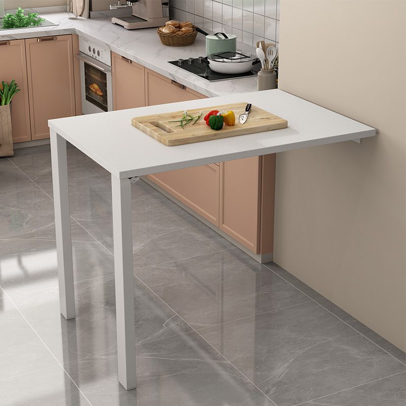 Flip-down dining table