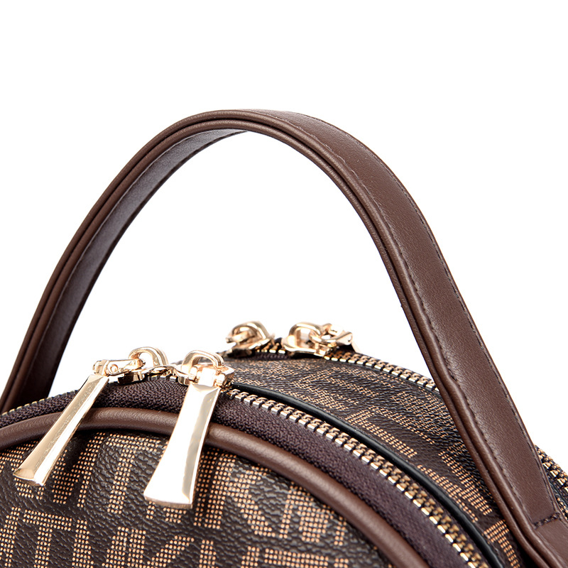 La nueva bolsa redonda impresa a mano de primavera 2023 tiene una piel suave de 98.501 hombros.