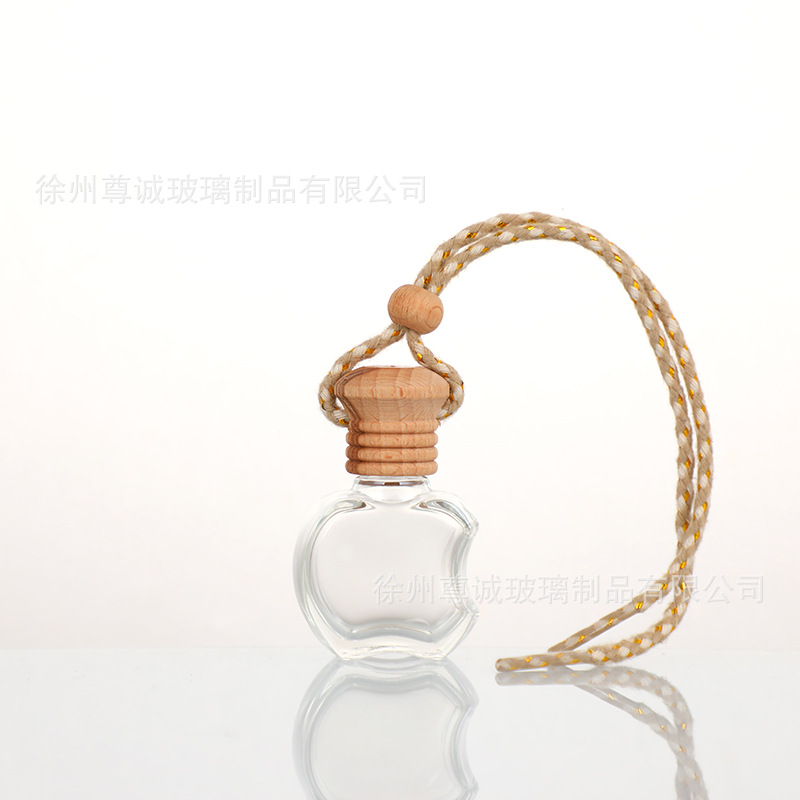 Botella de perfume de cables de automóvil botella vacía botella de perfume de automóvil colgante tapa de madera botella vacía perfumes volátiles al por mayor