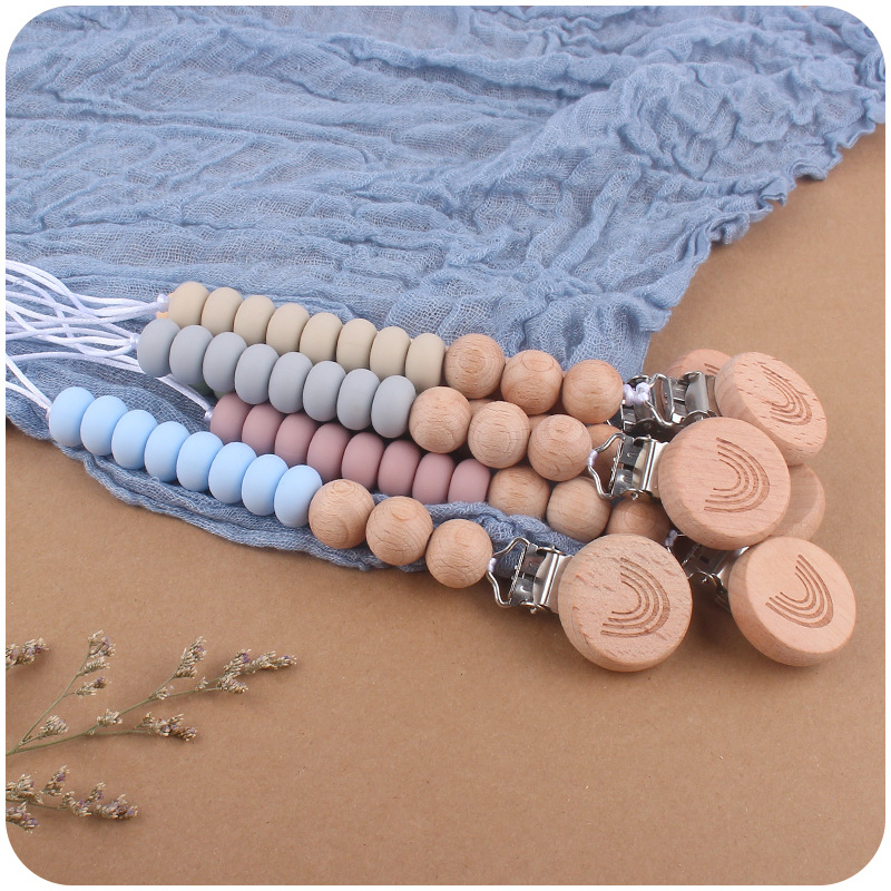 Nuevo bebé arco iris haya clip creativo bebé silicona Cuentas planas espaciador perlas mordedura cadena pezón cadena anti-caída Nuevo