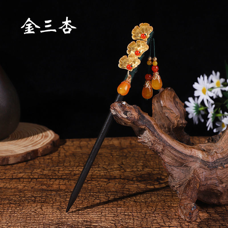 黒檀の木のかんざしのフリンジをまねて、かんざしの子供の古風な頭飾りをします。|undefined