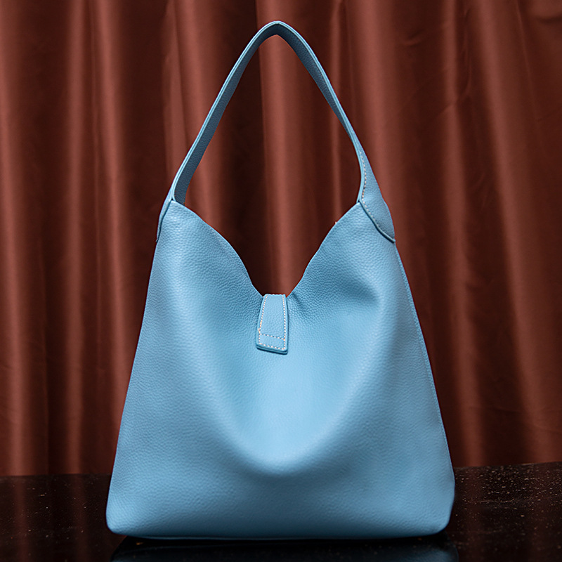 Neue handgehaltene Damen-Tasche mit körnigem Kieselmuster und einer Schulter unter dem Arm_voghion.com