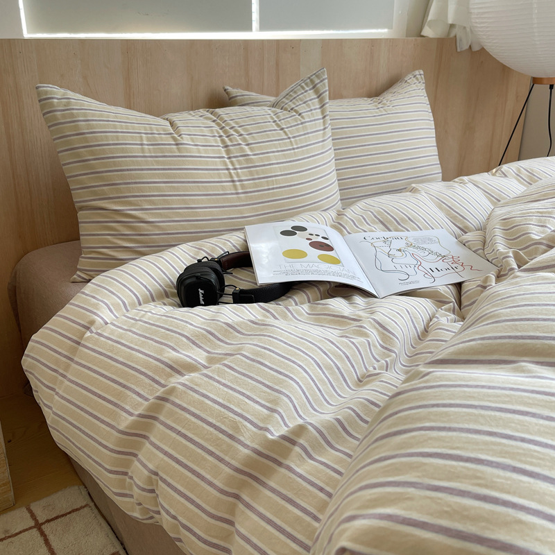 Una clase de algodón cuatro piezas de tejido de agua lavado sábanas de algodón cubierta dormitorio de estudiantes cama de tres piezas de impresión y teñido activo