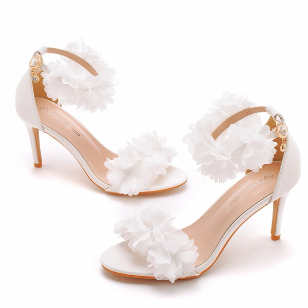 White sandals low-cut with a strap stiletto heels