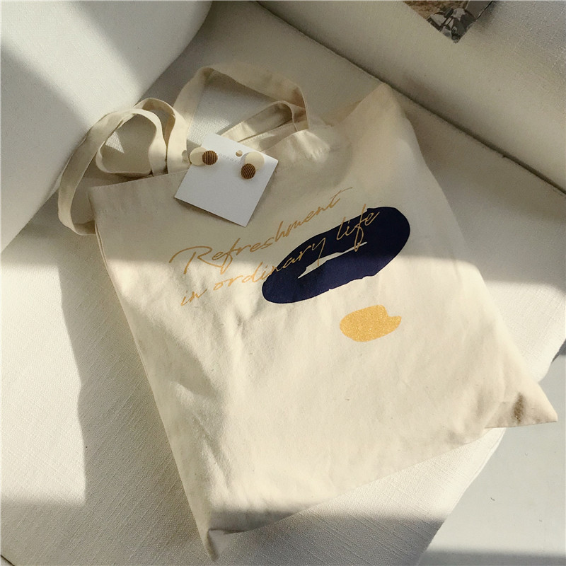 E131 canvas bag, Korean-style ins hand-held shoulder bag, color block letter graffiti shopping bag, female student's search for sources Specification drawing