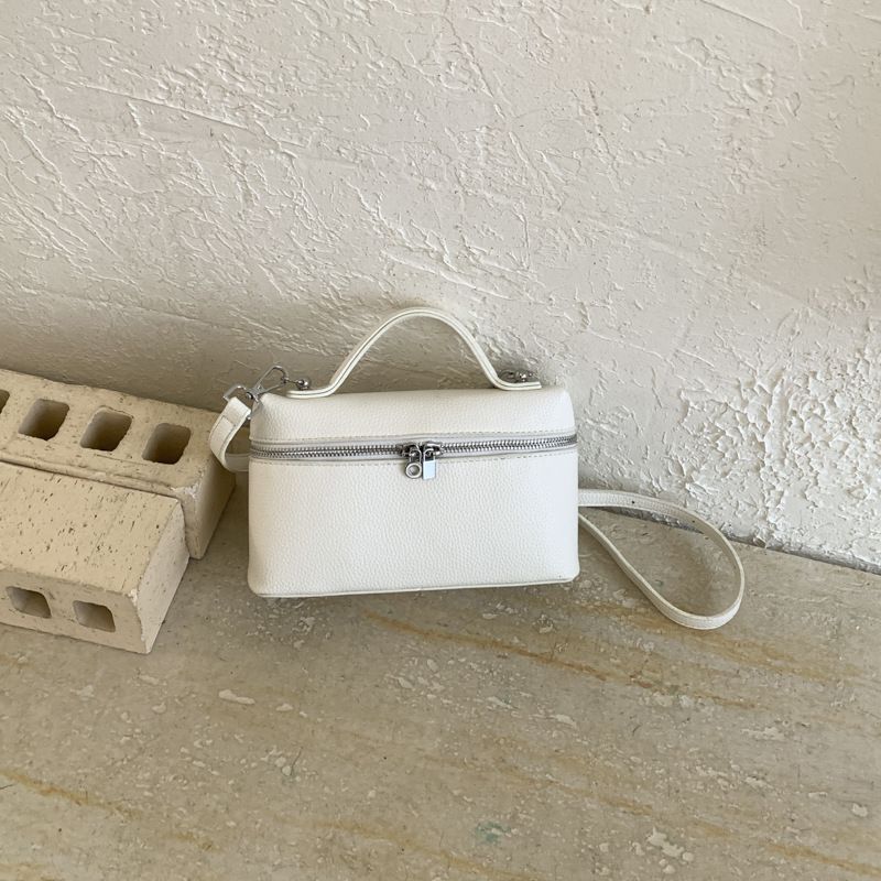 Nicho Zhong bolso de almuerzo portátil para mujeres 2026 nuevo litchi estampado mochila de hombro bolso tridimensional bolso de caja de moda
