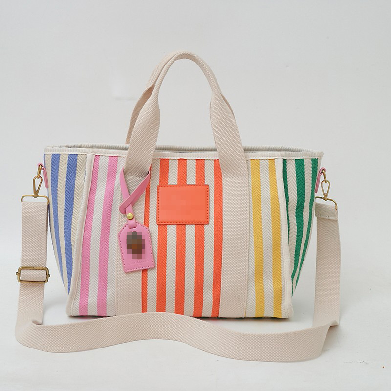 Bolso grande de cercanías para mujer, nuevo estilo de primavera, bolso de lona de viaje y vacaciones, bolso de cabeza de águila personalizado, bolso de mujer portátil de todo fósforo