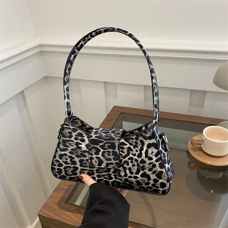 Moda europea y americana bolsos de brazo, leopardo, bolsos de mujer, 2024 invierno, bolsos de moda personales, bolsos de hombro literarios de moda.
