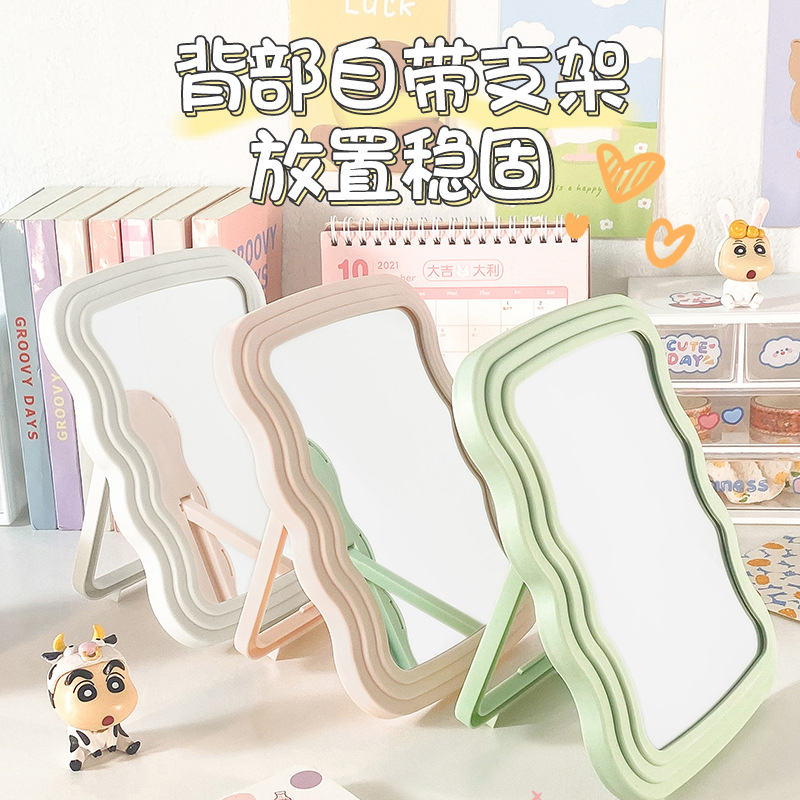 Espejo de maquillaje ondulado de maquillaje de niñas macarrón de alto valor espejo de dormitorio de oficina portátil colgar espejo