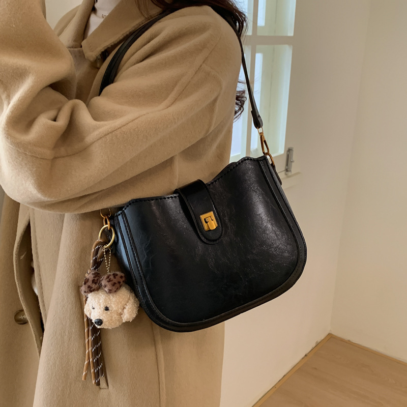 Vintage cera de piel debajo de la axila bolso de cubo bolso de viaje para mujeres otoño y invierno 2025 nuevo estilo coreano mochila de hombro casual